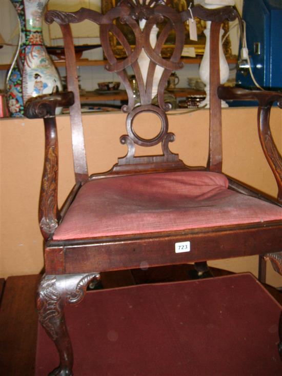 George III carved mahogany open arm chair on cabriole legs and claw and ball feet with castors (a.f)